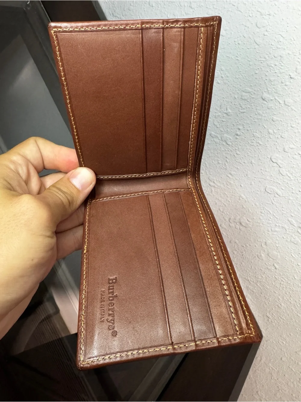 Burberry bifold featuring